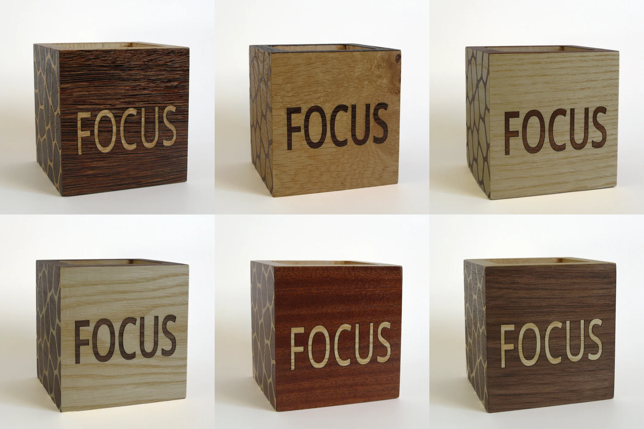 Die sechs FOCUS Varianten nebeneinander: Wenge/Eiche, Eiche/Nuss, Esche/Mahagoni, Esche/Nuss, Mahagoni/Esche und Nuss/Esche